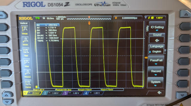 Photo of Rigol DS1054Z oscilloscope. The axis scales are 50 ns/division horizontally and 25 mV/division vertically. Input 1 is showing a square wave of amplitude 170mV and period 151.0ns.